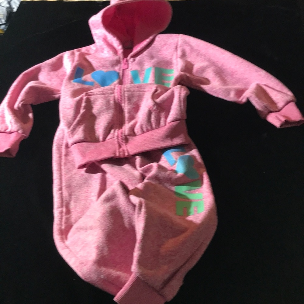 Pink and blue hooded sweatsuit with zipper.